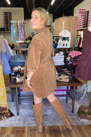 Side view of the Umgee N7059 mocha corduroy babydoll dress showing the relaxed silhouette and above-the-knee length