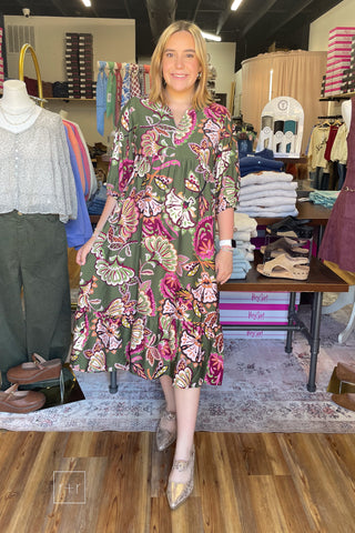 Front view of the Umgee olive paisley tiered midi dress K0645 with magenta, pink and gold florals, styled with the Corkys Knot Gonna Happen gold pointy toe heeled mule.