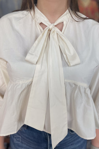 Wishlist Cream Cotton Peplum Ruffle Hem Crop Top Front Tie Puff Sleeve front tie closeup