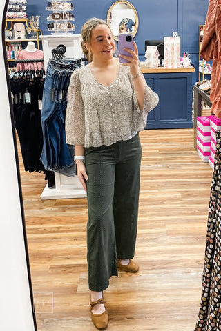 Wishlist Floral Tiered Blouse WL26-13747 styled with Wishlist Hunter Green Micro Polka Dot Corduroy Wide Leg Pants and Corkys Layover flats, worn in a mirror selfie