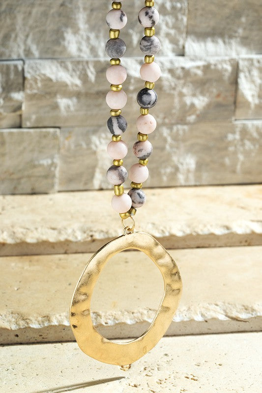 pink zebra stone with gold bead long necklace and gold hammered circle pendant