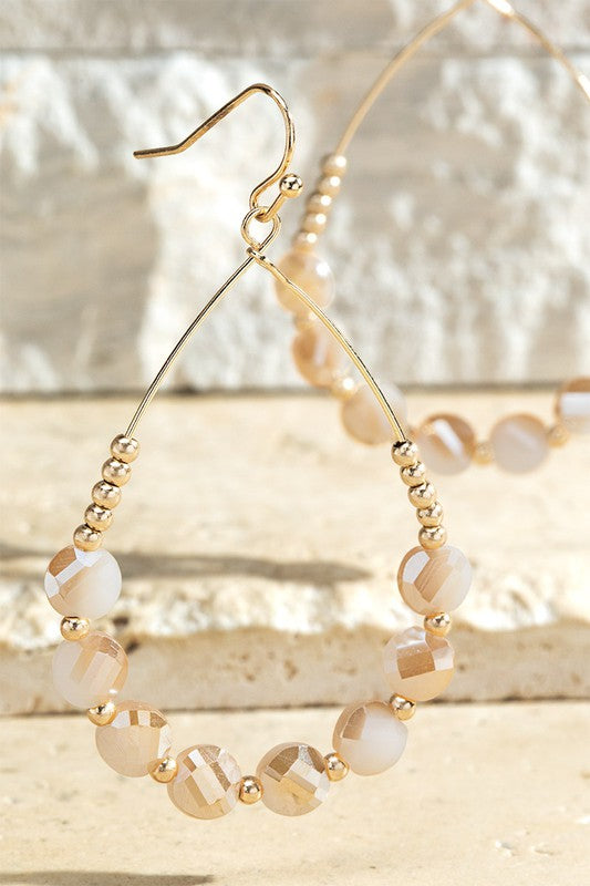 gold and ivory teardrop earrings with glass beads