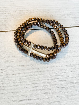 beautiful bronze and brown glass bead 3-strand bracelet with gold cross accent piece